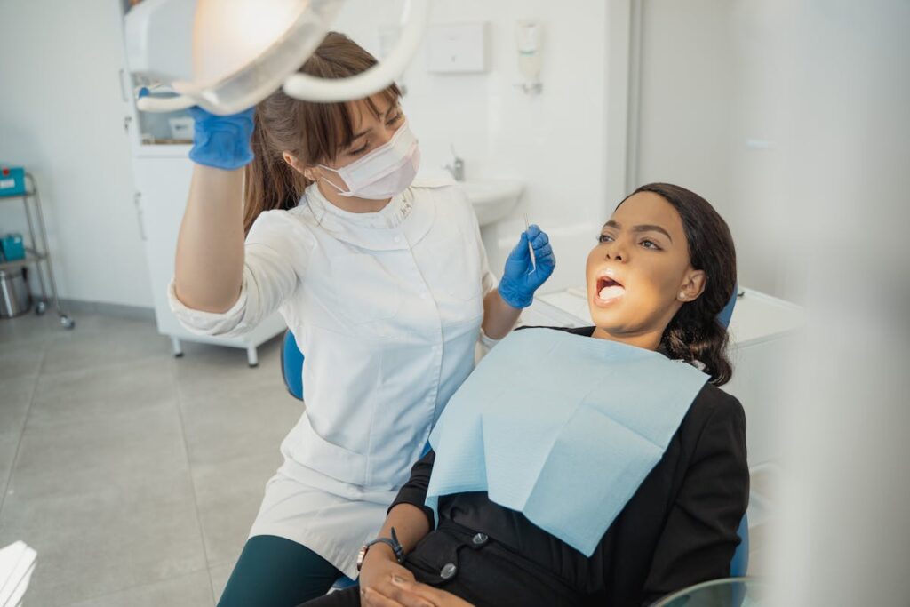 A Dentist Treating a Patient