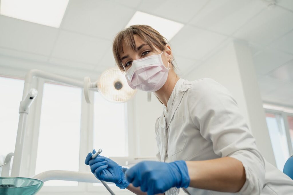 Low Angle Shot of a Female Dentist