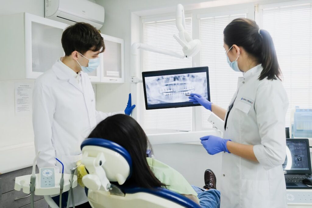 Man and Women Looking at X-ray