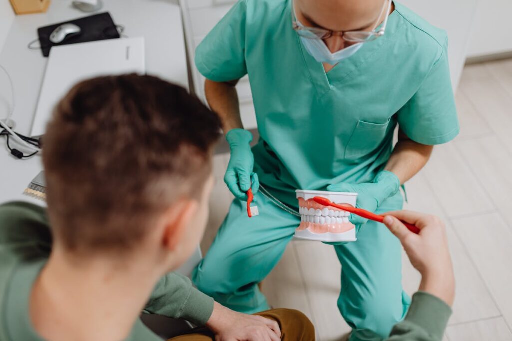 Dentist having a Discussion with a Patient